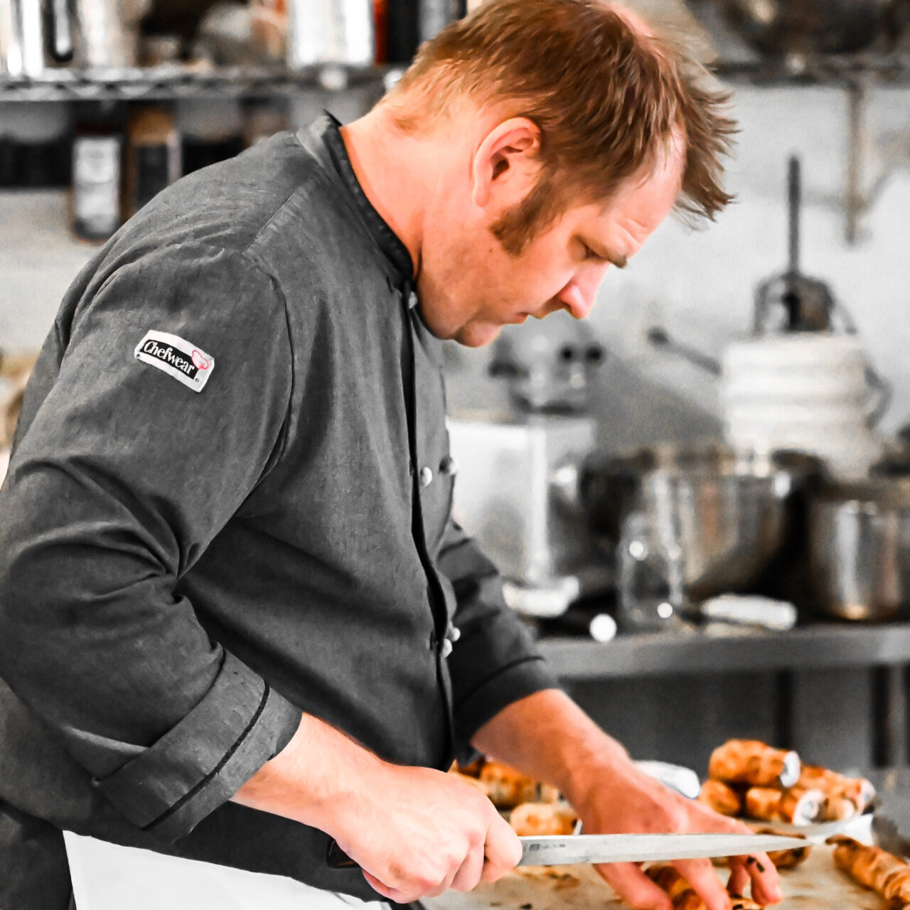 Matt Jenson chopping and preparing food